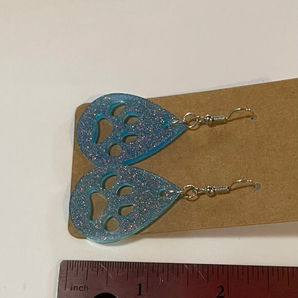 Handmade epoxy resin paw print earrings - light blue glitter w/ rosegold flecks - Picture 3 of 4